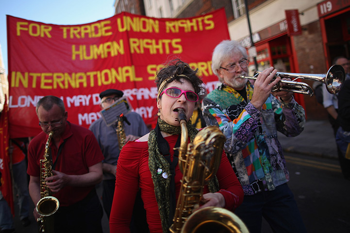 May Day afternoon: A band plays during the annual May Day march in London