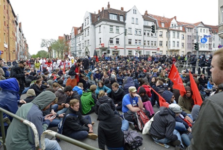 Left-wing demonstrators block the demonstration route of a far-right May Day rally in Erfurt, Germany, Wednesday, May 1, 2013.