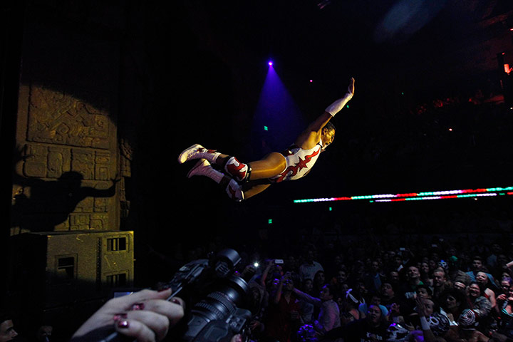 20 Photos: Lucha libre wrestler Cassandro leaps into the audience in Los Angeles