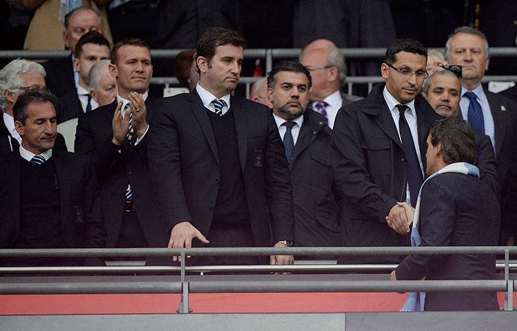 TJ Cup Final 4 : Roberto Mancini shakes hands with Man City chairman Khaldoo al Mubarrak