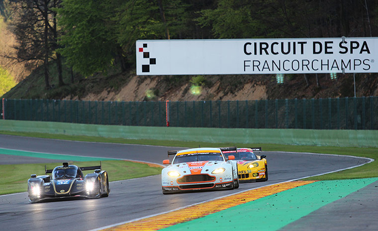 spa:  A Lotus LMP2 goes up the inside of the Aston Martin and Corvette 