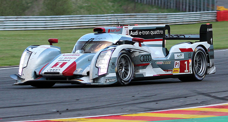 spa: Leading lights as the race-winning Audi brakes into the Bus Stop