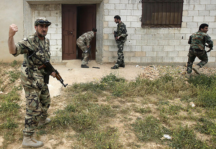 Syrian troops in Homs: Syrian troops retake village in Homs 