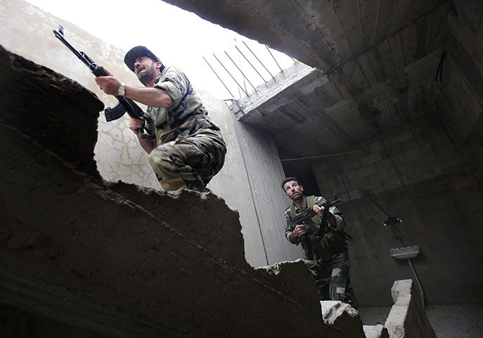 Syrian troops in Homs: Syrian troops retake village in Homs 
