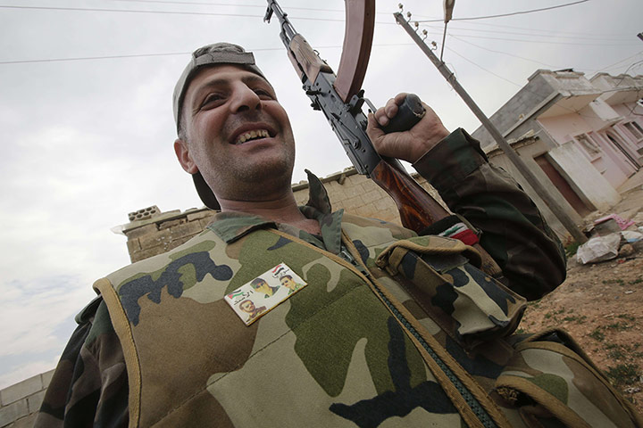 Syrian troops in Homs: Syrian troops retake village in Homs 