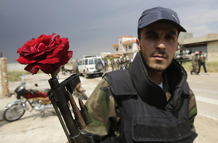 Syrian troops in Homs: Syrian troops retake village in Homs 