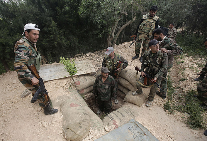 Syrian troops in Homs: Syrian troops retake village in Homs 