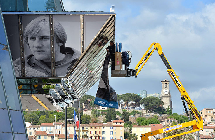 Cannes preperations: The Palais des Festivals gets covered its film festival face lift