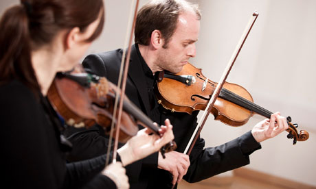 Ensemble 360 members playing in the round