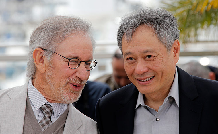 Jury photocall: Steven Spielberg speaks with jury member Ang Lee