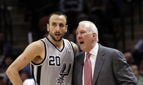 San Antonio Spurs head coach Gregg Popovich (R) and guard Manu Ginobili talk during the second half of their NBA Western Conference quarterfinal playoff basketball game against the Golden State Warriors in San Antonio Texas May 14, 2013.  REUTERS/Mike Stone (UNITED STATES - Tags: SPORT BASKETBALL) :rel:d:bm:GF2E95F0DF801