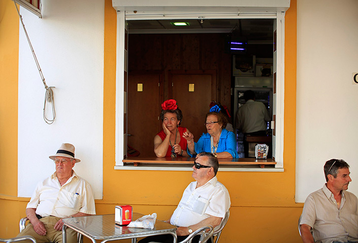 Pilgrims: Pilgrims from the Fuengirola fellowship are seen in a bar in Coria del Rio