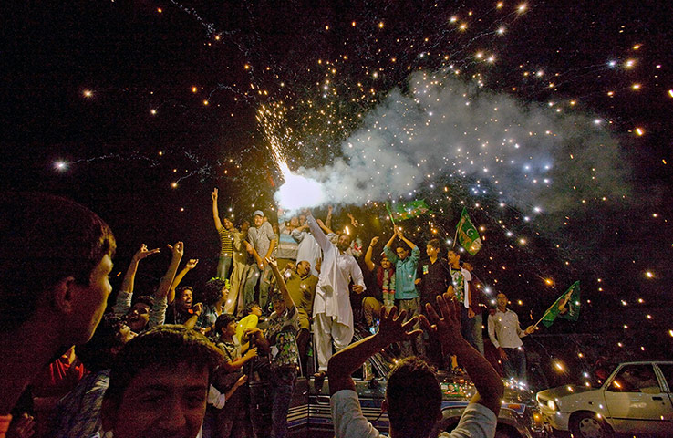 20 Photos: Supporters of Pakistan Muslim League-N party celebrate the party's victory