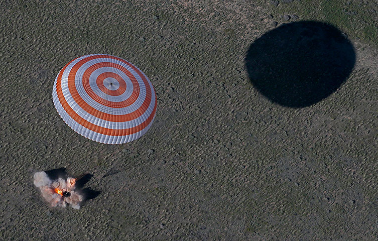 20 Photos: The Soyuz TMA-07M spacecraft lands with Expedition Commander Chris Hadfield