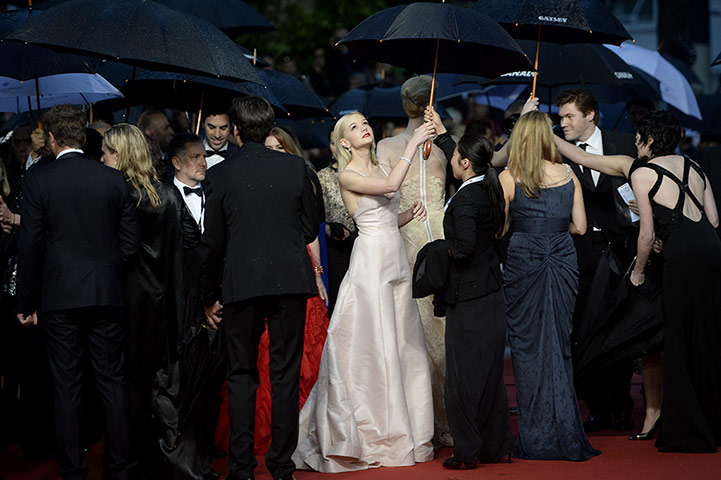 20 Photos: Actress Carey Mulligan holds an umbrella in Cannes