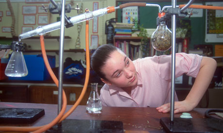 Female pupils in science lesson, St Saviour's & St Olave's School, Southwark, London, UK.