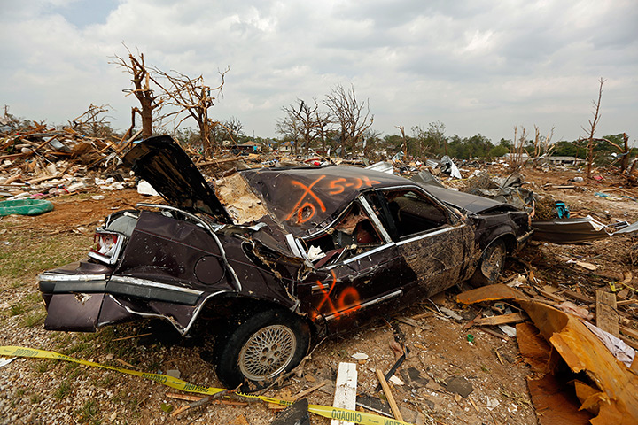 Tornado in USA: A smashed car sits in a field in Granbury, Texas