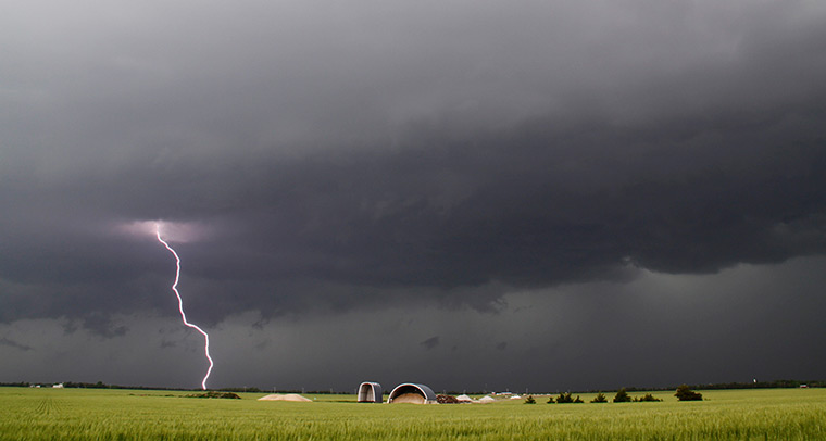 Tornado in the USA: Lightning from a tornado passing over Clearwater, Kansas strikes 