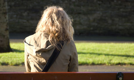 rear view young blonde woman 