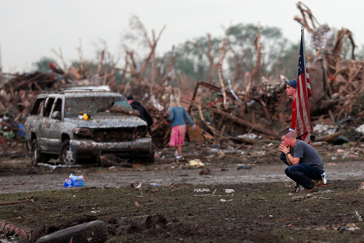 People in front of the Plaza Towers elementary school