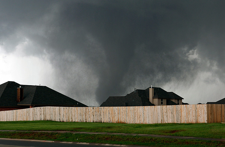 EF-4 update: A tornado moves past homes in Moore