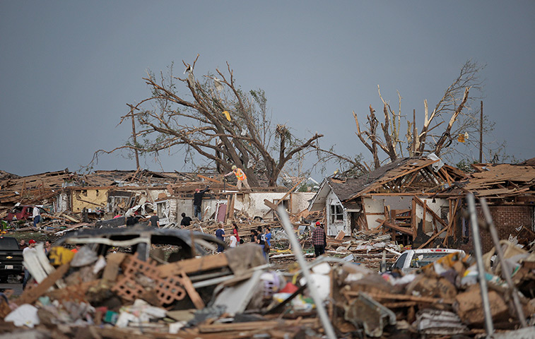EF-4 update: People assess the damage to properties