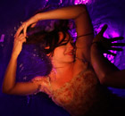 Dancers perform on a watery stage suspended above the audience in Buenos Aires