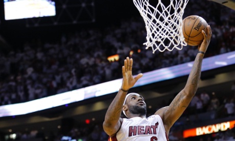 LeBron James Writen a statement Miami Heat's LeBron James (R) makes the game-winning shot in overtime against Indiana Pacers' Sam Young (L) during Game 1 of their NBA Eastern Conference final basketball playoff in Miami, Florida May 22, 2013. REUTERS/Joe Skipper (UNITED STATES - Tags: SPORT BASKETBALL TPX IMAGES OF THE DAY) :rel:d:bm:GF2E95N0B1D01