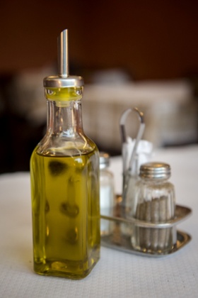 The offending item. The European Union decreed on Thursday that restaurants in its 27-nation market can continue to put refillable olive-oil bottles on tables, dropping a ban that was scheduled to take effect in 2014.