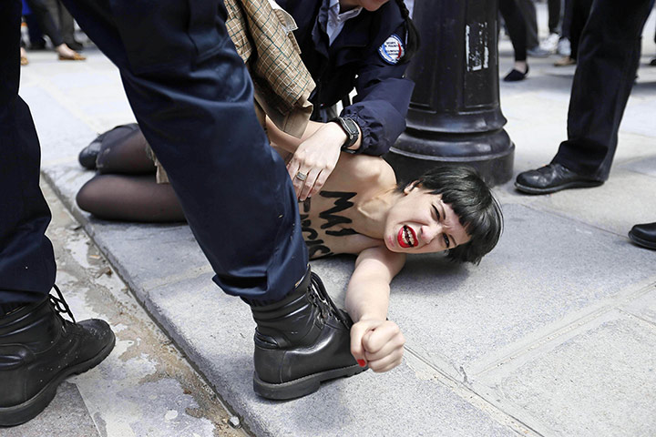 20 Photos: A member of the FEMEN feminist activist protests in Paris