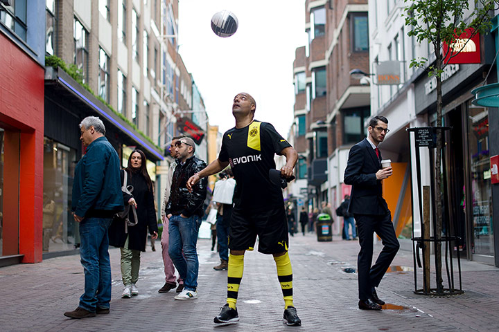 Germans in London: A man in a Borussia Dortmund kit on Carnaby Street