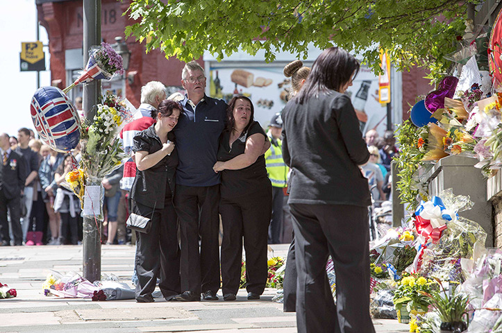 Woolwich tributes: The family of Drummer Lee Rigby arrive at the site