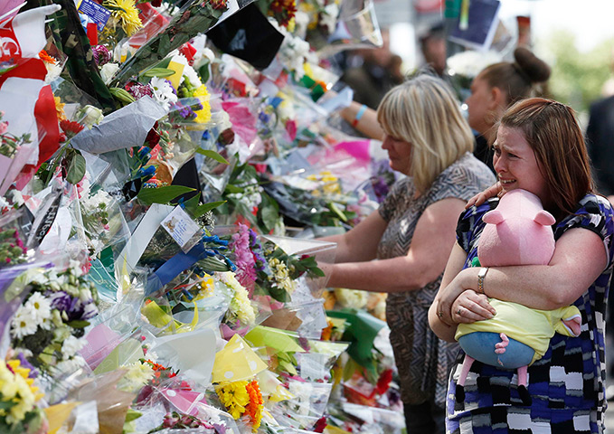Woolwich tributes: Rebecca Rigby, right, the estranged wife of murdered British soldier Lee Ri
