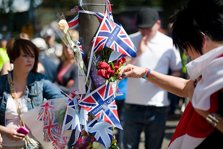 Woolwich tributes: People look at  floral tributes, mementos and messages 