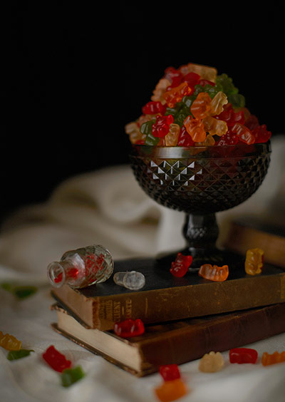 big picture - band riders: sweets in a bowl on top of some books