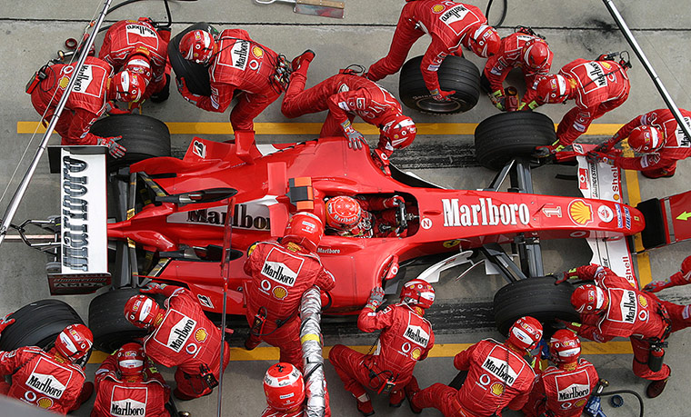 Tobacco advertising: A Ferrari racecar at a pit stop during the 2004 Malaysian Grand Prix