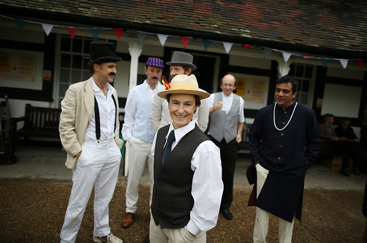 Victorian cricket match: England cricketer Claire Taylor stands with team members