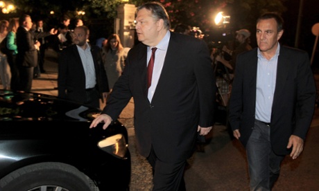PASOK party leader Evangelos Venizelos (C) leaves the Prime Minister's office after a meeting in Athens, Greece, 27 May 2013.PANTZARTZI