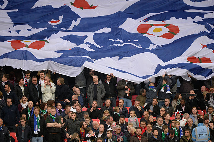 England v Republic: England fans pass around a huge flag
