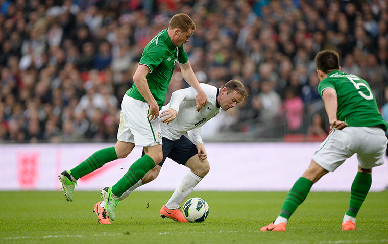 TJ 2: Wayne Roooney is under pressure from James McCarthy 