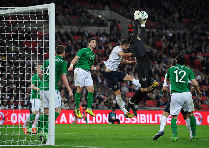 TJ 3: David Forde catches a corner in front of Gary Cahill 