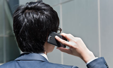 Businessman talking on smartphone