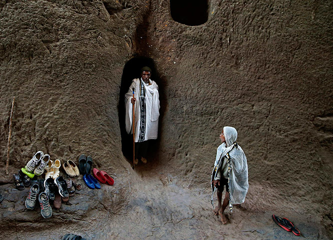20 Photos: An Orthodox Christian at the monolithic rock-cut churches in Lalibela