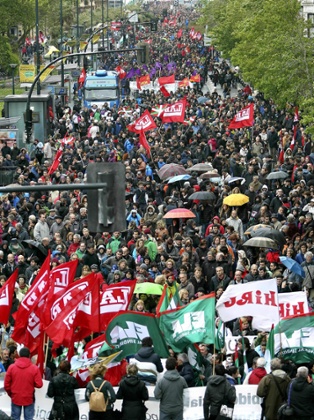 Thousands of people take part in a protest during a 24-hour general strike called by the major Basque unions in protest against the spending cuts approved by the Spanish and Basque governments, in San Sebastian, the Basque Country, Spain, 30 May 2013.