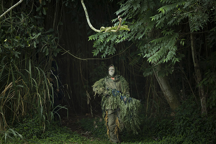 20 Photos: a Brazilian navy sniper takes part in a hostage rescue drill, near Rio de Janeiro, Brazil