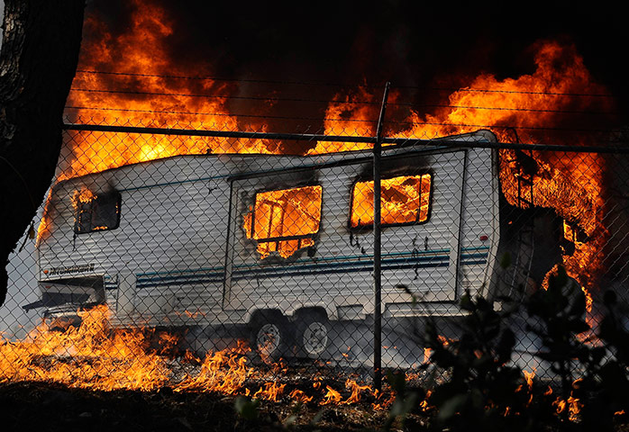 California wildfire: A trailer is engulfed in flames