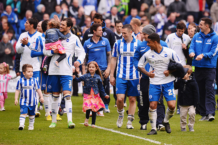 emotions: Brighton & Hove Albion players celebrate clinching their play-off spot 