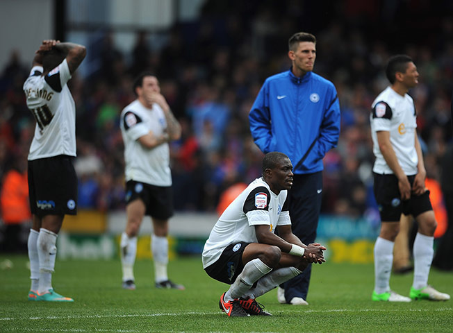 emotions: Dejected Peterborough United players