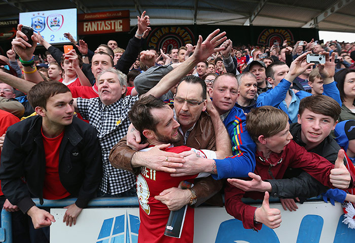 emotions: Jim O'Brien of Barnsley celebrates survival with fans