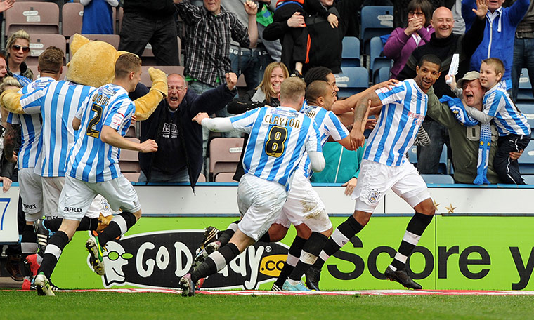 emotions: Jermaine Beckford celebrates with team-mates 